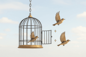 Pajaros saliendo de una jaula simulando la liberación de la ansiedad